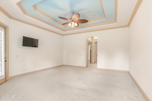 106 Villa Sovana Ct, Saint Johns, FL 32259 - unfurnished room featuring ornamental molding, a raised ceiling, and arched walkways