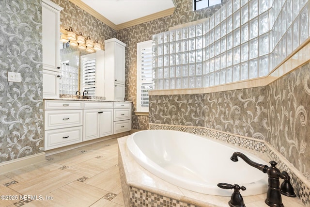 106 Villa Sovana Ct, Saint Johns, FL 32259 - bathroom featuring wallpapered walls, vanity, ornamental molding, and a bath