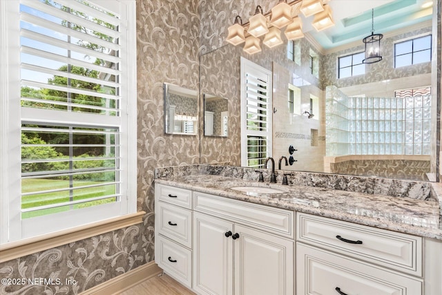 106 Villa Sovana Ct, Saint Johns, FL 32259 - full bath featuring wallpapered walls, baseboards, vanity, and tiled shower