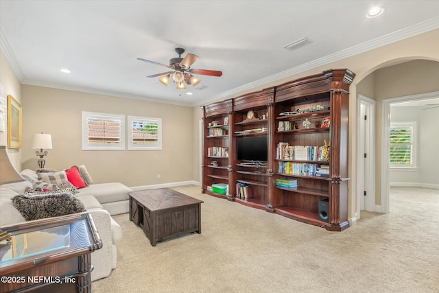 106 Villa Sovana Ct, Saint Johns, FL 32259 - living room featuring visible vents, crown molding, ceiling fan, carpet flooring, and arched walkways