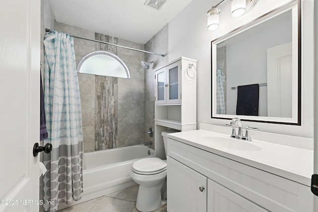 full bathroom with tile patterned floors, vanity, shower / bath combination with curtain, toilet, and visible vents