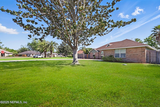 view of yard with fence
