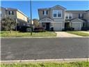 1500 Calming Water Dr Unit 5501, Fleming Island, FL 32003 - view of front of property with an attached garage and driveway
