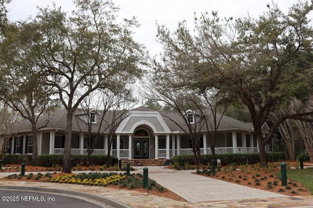 1500 Calming Water Dr Unit 5501, Fleming Island, FL 32003 - view of front of house with a porch