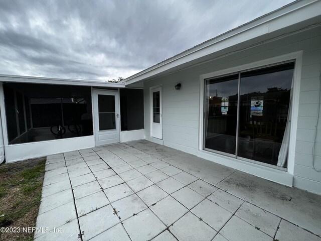 451 Whiting Ln, Atlantic Beach, FL 32233 - view of patio / terrace featuring a sunroom