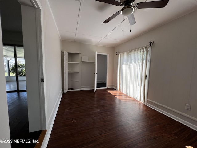 451 Whiting Ln, Atlantic Beach, FL 32233 - unfurnished bedroom with baseboards, a ceiling fan, and wood finished floors