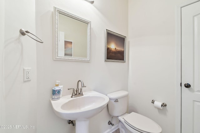 135 Bayberry Cir Unit 1608, Saint Augustine, FL 32086 - bathroom with toilet, baseboards, and a sink