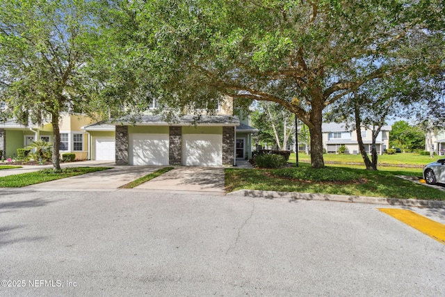 135 Bayberry Cir Unit 1608, Saint Augustine, FL 32086 - view of front of house with driveway, a front lawn, and a garage