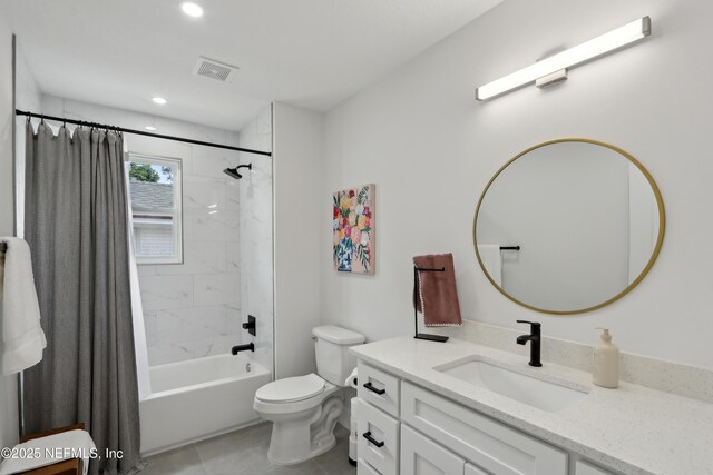 1407 Palmer Ter, Jacksonville, FL 32207 - full bathroom featuring toilet, vanity, tile patterned flooring, shower / tub combo, and recessed lighting