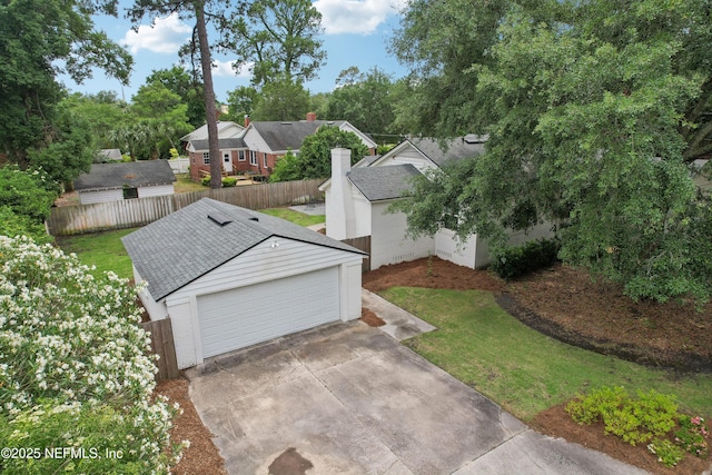 1407 Palmer Ter, Jacksonville, FL 32207 - exterior space with a shingled roof, a garage, and a chimney