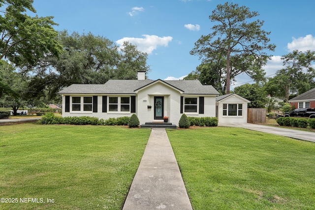 1407 Palmer Ter, Jacksonville, FL 32207 - ranch-style home with a chimney and concrete driveway