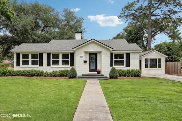 1407 Palmer Ter, Jacksonville, FL 32207 - ranch-style house featuring a chimney, brick siding, and roof with shingles