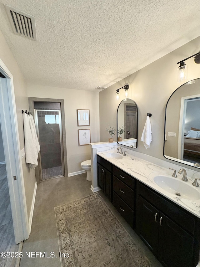 6128 Copper Ridge Cir, Macclenny, FL 32063 - bathroom with a sink, toilet, a textured ceiling, and visible vents