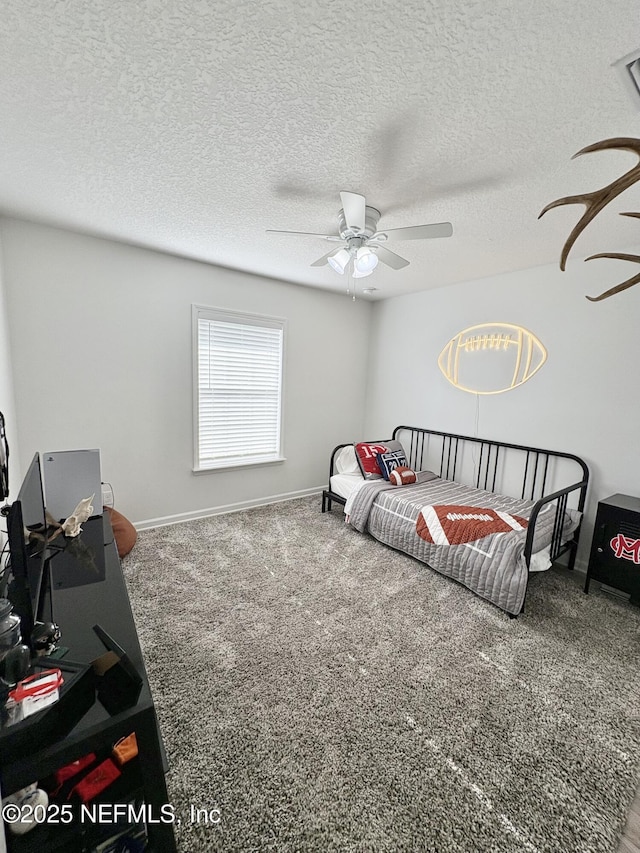 6128 Copper Ridge Cir, Macclenny, FL 32063 - carpeted bedroom featuring baseboards, a ceiling fan, and a textured ceiling