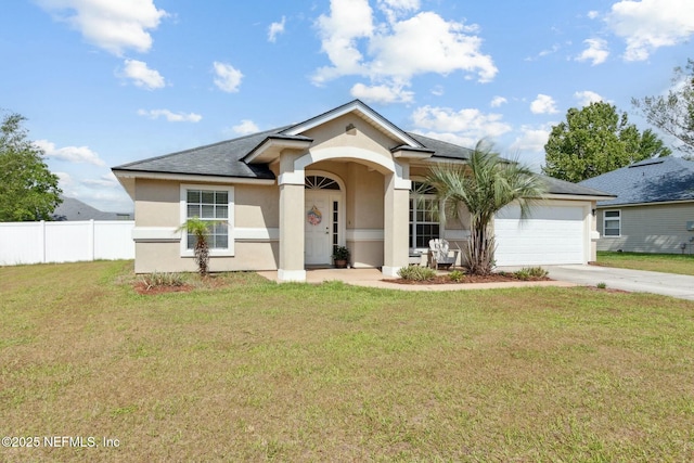 ranch-style home featuring a garage, fence, stucco siding, and concrete driveway