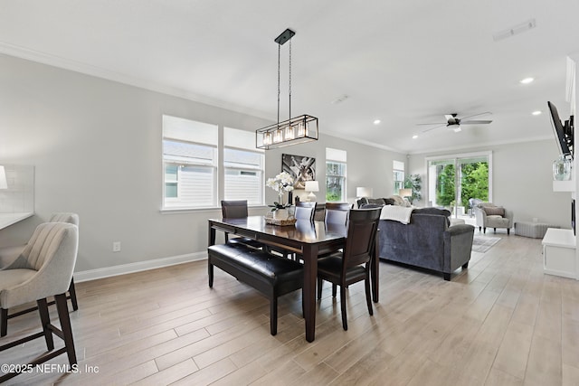 291 Greenway Ln, Saint Augustine, FL 32092 - dining space with plenty of natural light, ornamental molding, and light wood-style floors