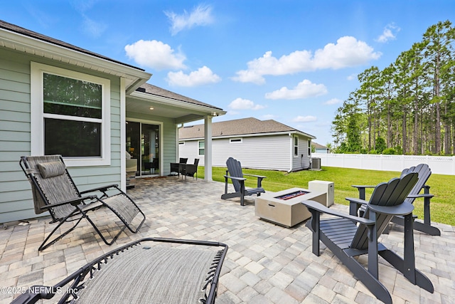291 Greenway Ln, Saint Augustine, FL 32092 - view of patio featuring fence, cooling unit, and a fire pit