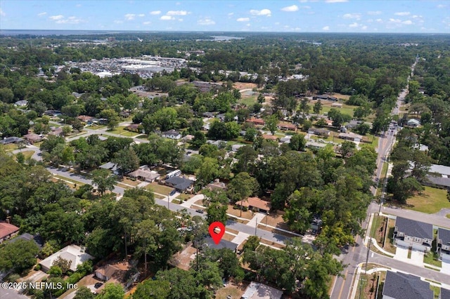 birds eye view of property with a residential view
