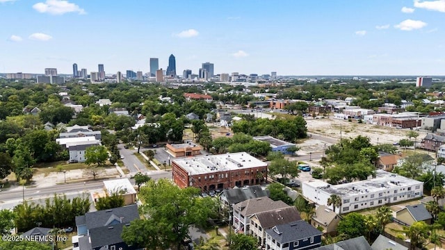 drone / aerial view featuring a city view