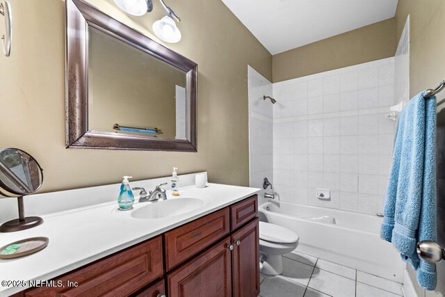 full bathroom featuring shower / bathing tub combination, toilet, tile patterned flooring, and vanity