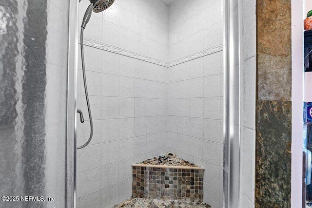 full bathroom featuring a stall shower
