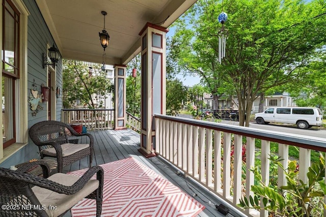 wooden deck with a porch