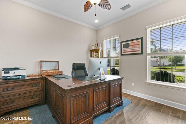 office space featuring ceiling fan, baseboards, dark wood-type flooring, visible vents, and ornamental molding
