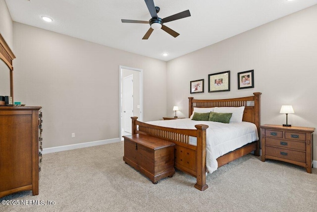 bedroom featuring light colored carpet, recessed lighting, baseboards, and ceiling fan