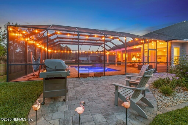 view of patio / terrace featuring a fenced in pool, a lanai, and a grill