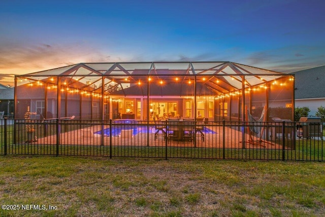 view of pool with a fenced in pool, a patio area, and fence