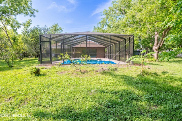 view of yard featuring an outdoor pool