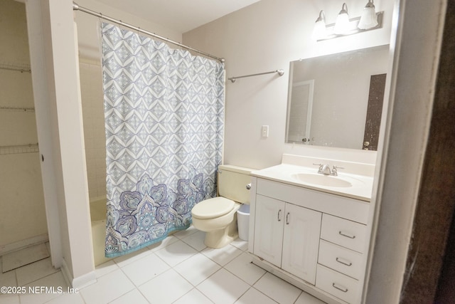 full bathroom featuring tile patterned floors, vanity, toilet, and shower / tub combo with curtain