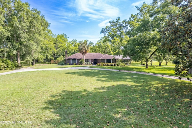 view of front of home with a front yard