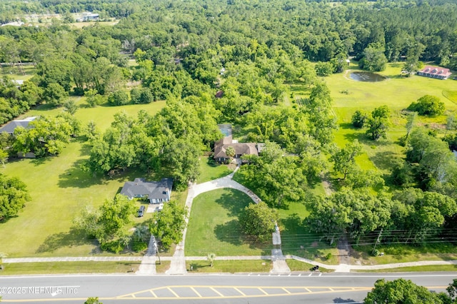 drone / aerial view with a forest view