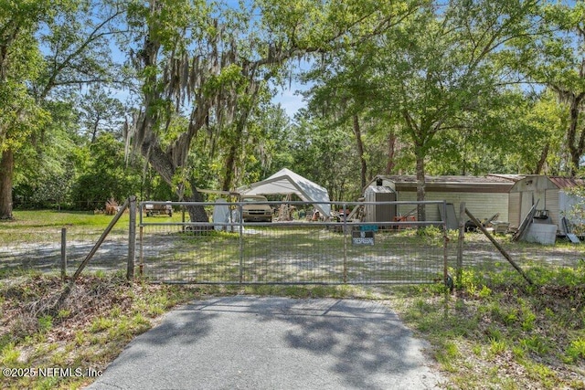 670 Hillsborough Ave, Florahome, FL 32140 - view of yard featuring a gate and fence
