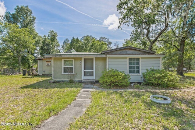 670 Hillsborough Ave, Florahome, FL 32140 - view of front facade with a front yard