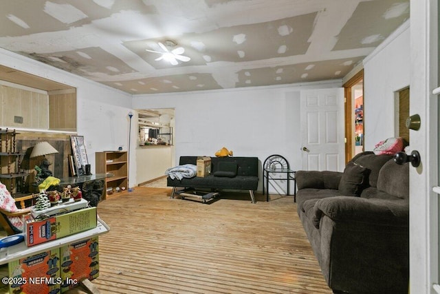 670 Hillsborough Ave, Florahome, FL 32140 - living area featuring ceiling fan and wood finished floors