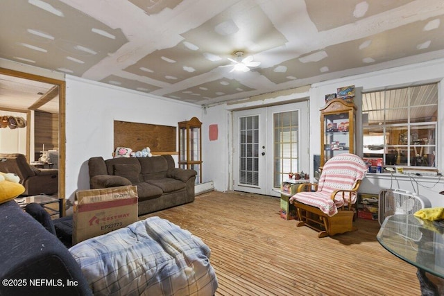 670 Hillsborough Ave, Florahome, FL 32140 - living room with wood finished floors, a ceiling fan, and french doors