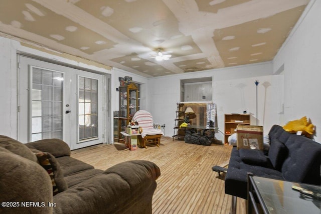 670 Hillsborough Ave, Florahome, FL 32140 - living area with wood finished floors, french doors, and ceiling fan