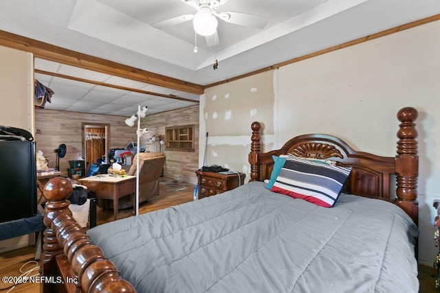 670 Hillsborough Ave, Florahome, FL 32140 - bedroom featuring wooden walls and wood finished floors