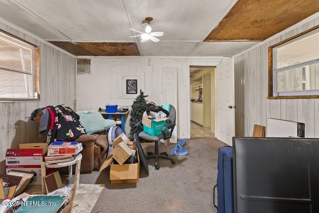 670 Hillsborough Ave, Florahome, FL 32140 - interior space featuring wooden walls and carpet
