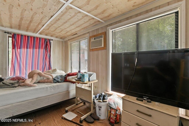 670 Hillsborough Ave, Florahome, FL 32140 - bedroom featuring a wall unit AC and wooden ceiling