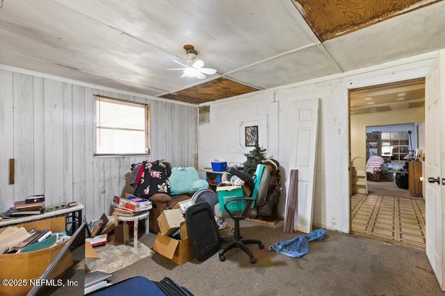 670 Hillsborough Ave, Florahome, FL 32140 - interior space featuring wooden walls and a ceiling fan