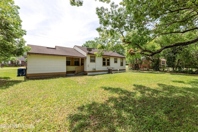 8344 Delaware Ave, Jacksonville, FL 32208 - back of property with a lawn
