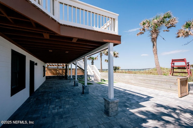 2818 Coastal Hwy, Saint Augustine, FL 32084 - view of patio with fence and stairs