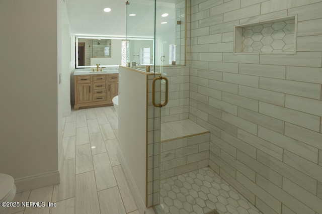2818 Coastal Hwy, Saint Augustine, FL 32084 - full bath featuring vanity, toilet, recessed lighting, baseboards, and a stall shower