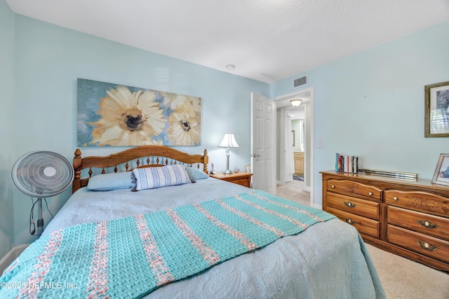 3434 Blanding Blvd Unit 214, Jacksonville, FL 32210 - bedroom featuring carpet floors, visible vents, and baseboards