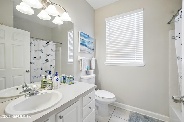 bathroom featuring tile patterned flooring, vanity, curtained shower, toilet, and baseboards
