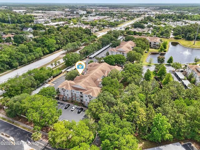 bird's eye view with a water view