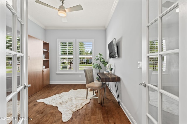 office area featuring a ceiling fan, french doors, baseboards, crown molding, and dark wood-style floors